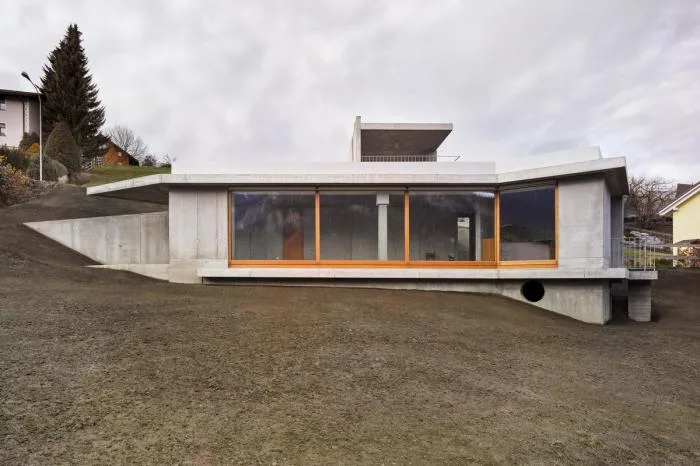 BIM Architecture | A Folding and Versatile Concrete Hut Surrounded by Mountains