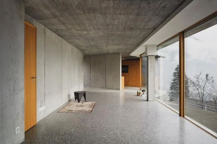 BIM Architecture | A Folding and Versatile Concrete Hut Surrounded by Mountains