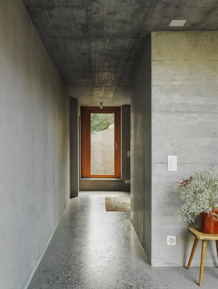 BIM Architecture | A Folding and Versatile Concrete Hut Surrounded by Mountains
