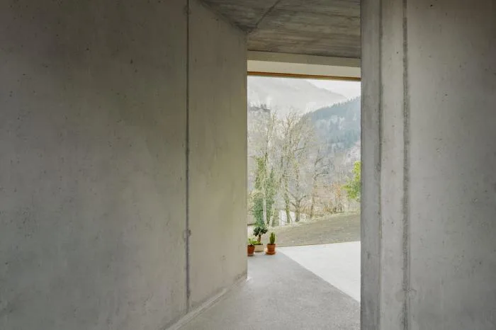 BIM Architecture | A Folding and Versatile Concrete Hut Surrounded by Mountains