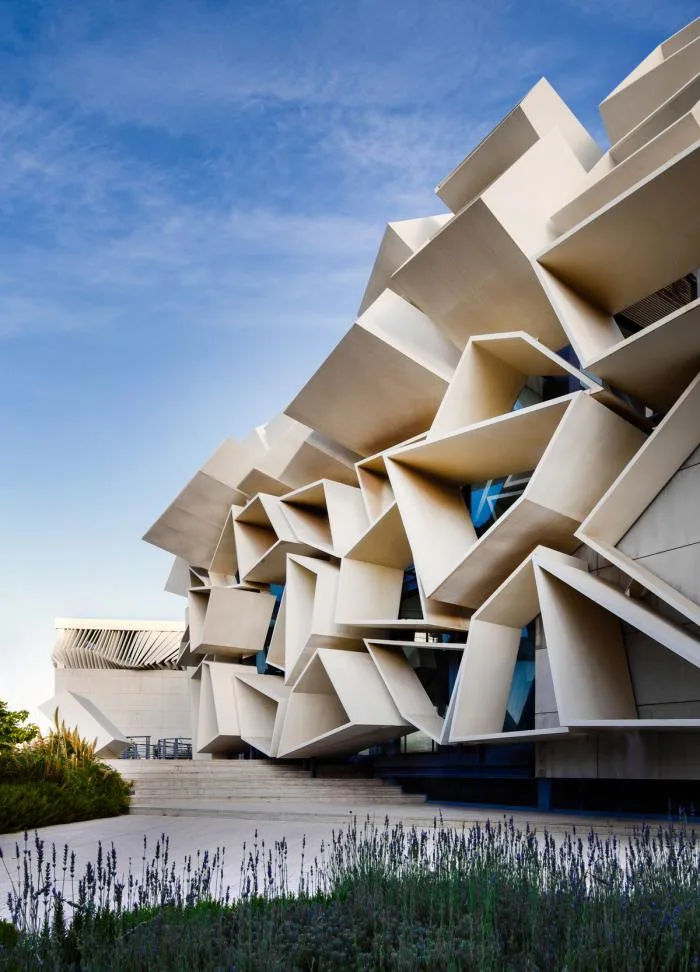 BIM architecture | Various folding panels assembled into a honeycomb like facade: Exhibition Building of Iran Greenland Convention Center