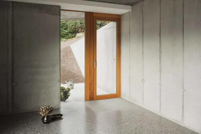BIM Architecture | A Folding and Versatile Concrete Hut Surrounded by Mountains