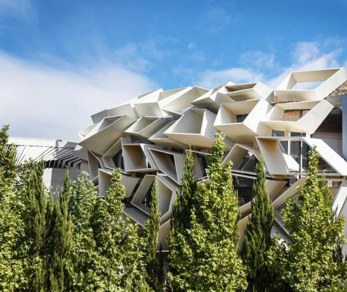 BIM architecture | Various folding panels assembled into a honeycomb like facade: Exhibition Building of Iran Greenland Convention Center