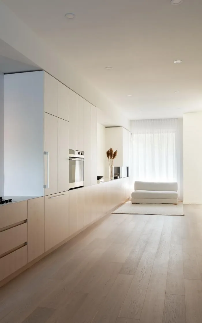 BIM Architecture | Burton Residence: Wooden long cabinets run through slender spaces/StudioAC