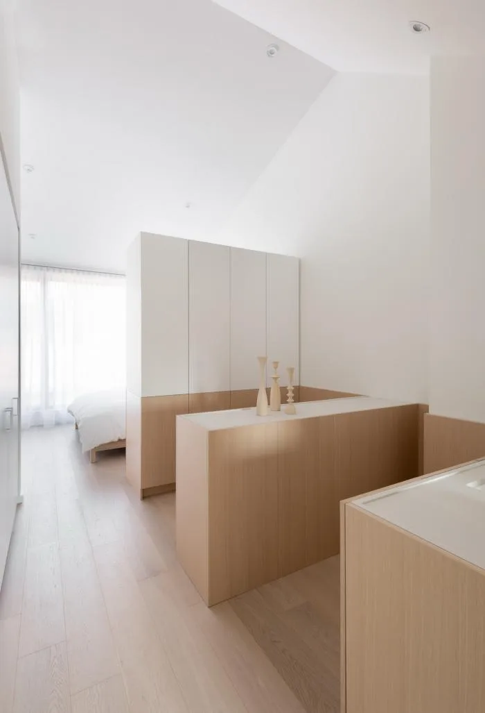 BIM Architecture | Burton Residence: Wooden long cabinets run through slender spaces/StudioAC