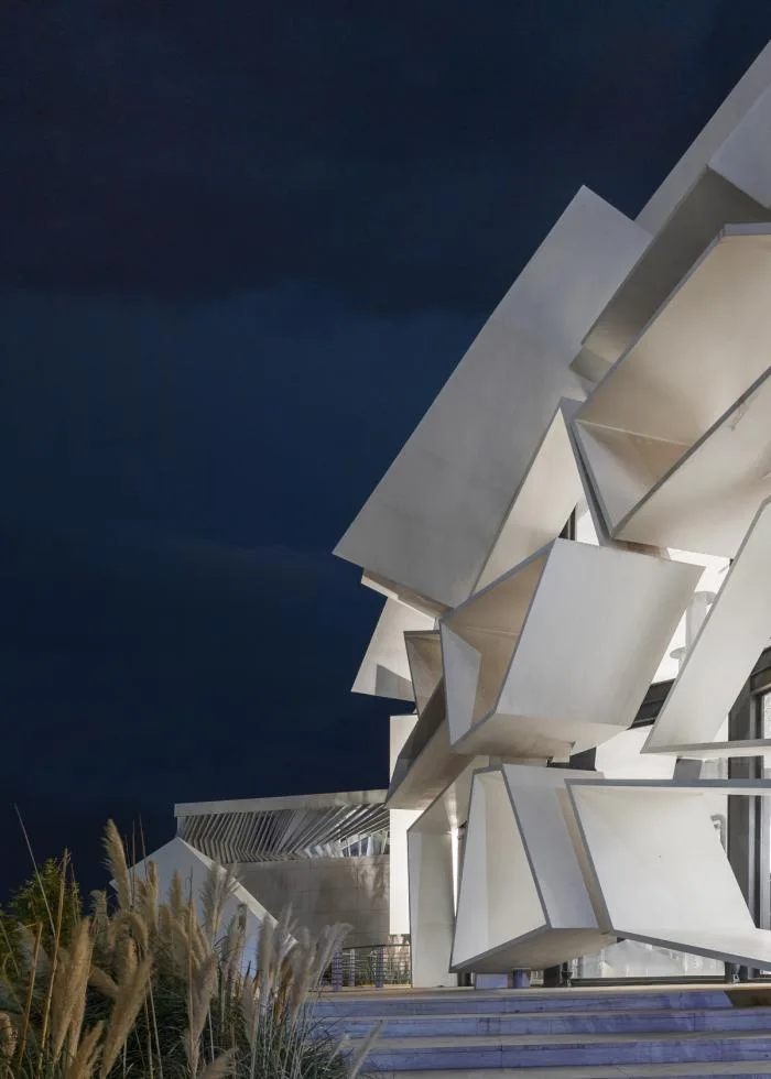 BIM architecture | Various folding panels assembled into a honeycomb like facade: Exhibition Building of Iran Greenland Convention Center