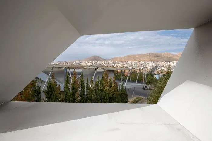 BIM architecture | Various folding panels assembled into a honeycomb like facade: Exhibition Building of Iran Greenland Convention Center