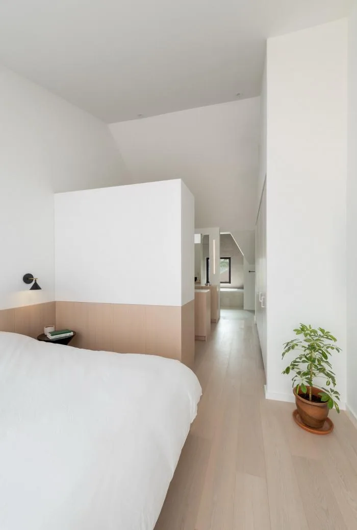 BIM Architecture | Burton Residence: Wooden long cabinets run through slender spaces/StudioAC