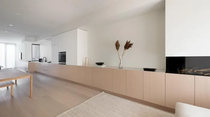 BIM Architecture | Burton Residence: Wooden long cabinets run through slender spaces/StudioAC