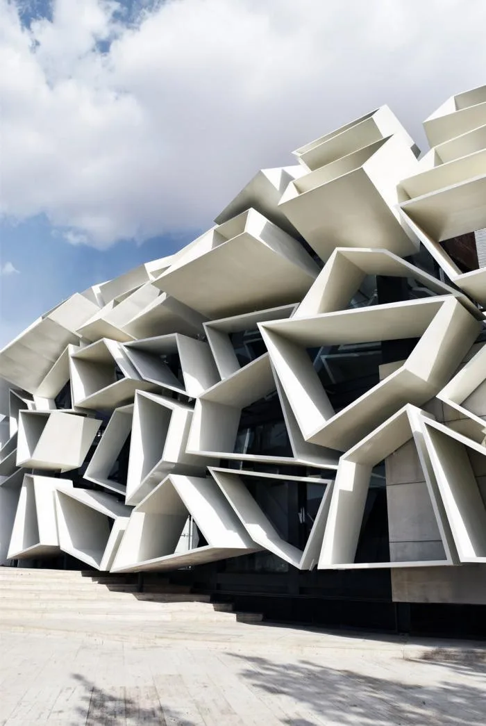 BIM architecture | Various folding panels assembled into a honeycomb like facade: Exhibition Building of Iran Greenland Convention Center