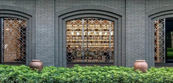 Window pane and blue brick complement each other