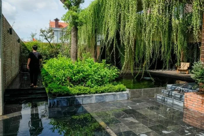 BIM Architecture | Enjoying the Courtyard, Watching Fish in Peace: Vietnam Green Screen Residence/HGAA