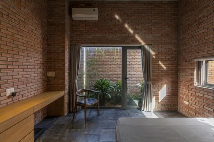 BIM Architecture | Enjoying the Courtyard, Watching Fish in Peace: Vietnam Green Screen Residence/HGAA