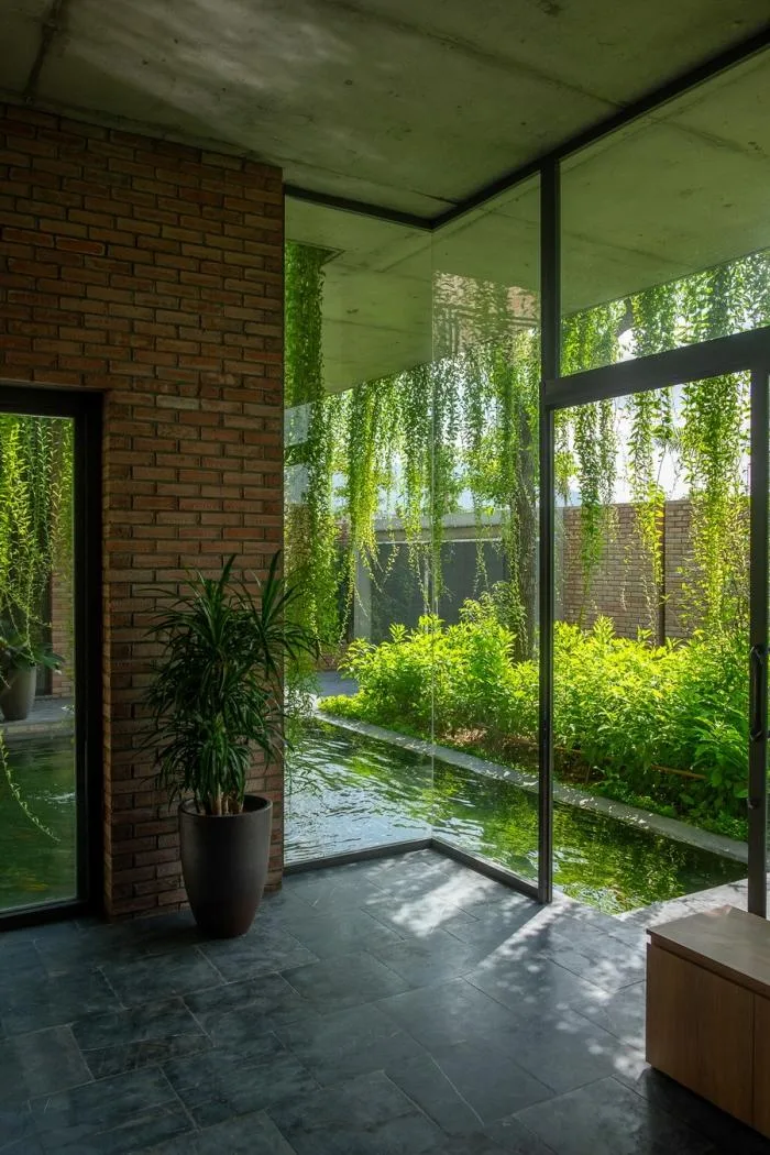 BIM Architecture | Enjoying the Courtyard, Watching Fish in Peace: Vietnam Green Screen Residence/HGAA