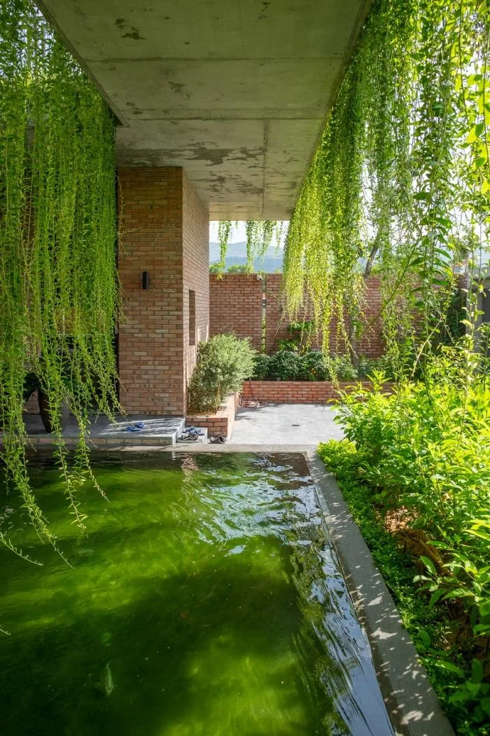 BIM Architecture | Enjoying the Courtyard, Watching Fish in Peace: Vietnam Green Screen Residence/HGAA