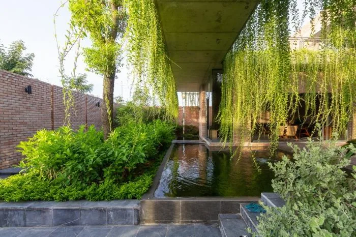 BIM Architecture | Enjoying the Courtyard, Watching Fish in Peace: Vietnam Green Screen Residence/HGAA