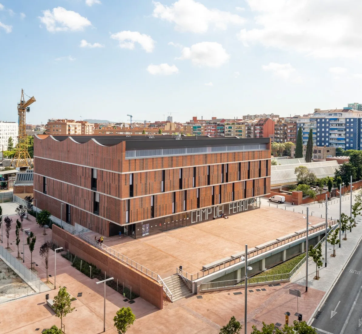 BIM Architecture | Semi underground Sports Stadium with Red Brick Walls | CAMP DEL FERRO Sports Center