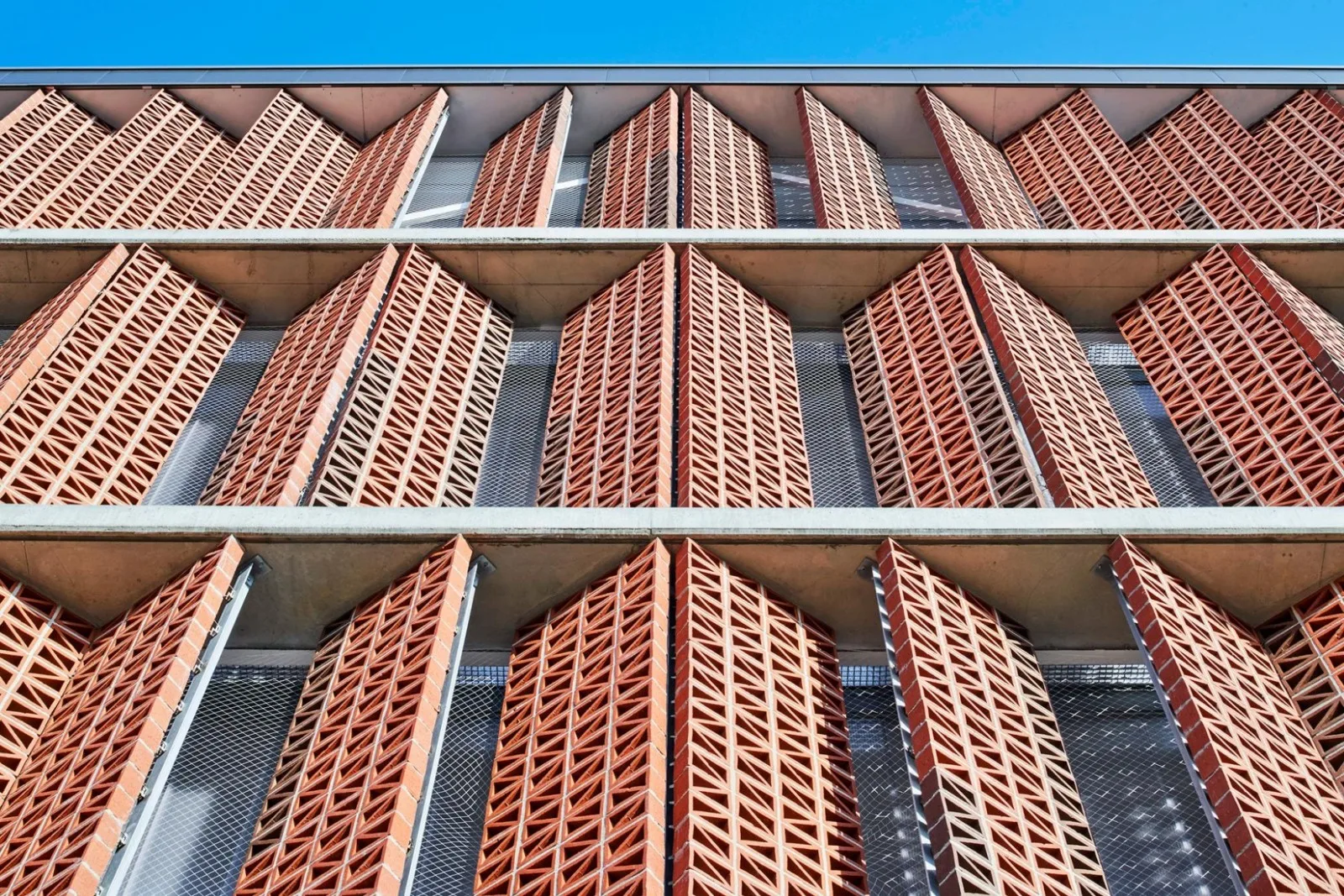 BIM Architecture | Semi underground Sports Stadium with Red Brick Walls | CAMP DEL FERRO Sports Center