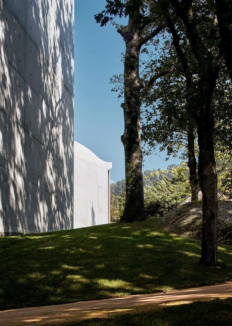 BIM Architecture | A concrete chapel nestled in the woods, serene, elegant, and full of natural atmosphere, by Nicholas Burns, Portugal