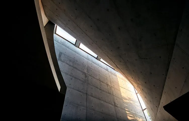 BIM Architecture | A concrete chapel nestled in the woods, serene, elegant, and full of natural atmosphere, by Nicholas Burns, Portugal