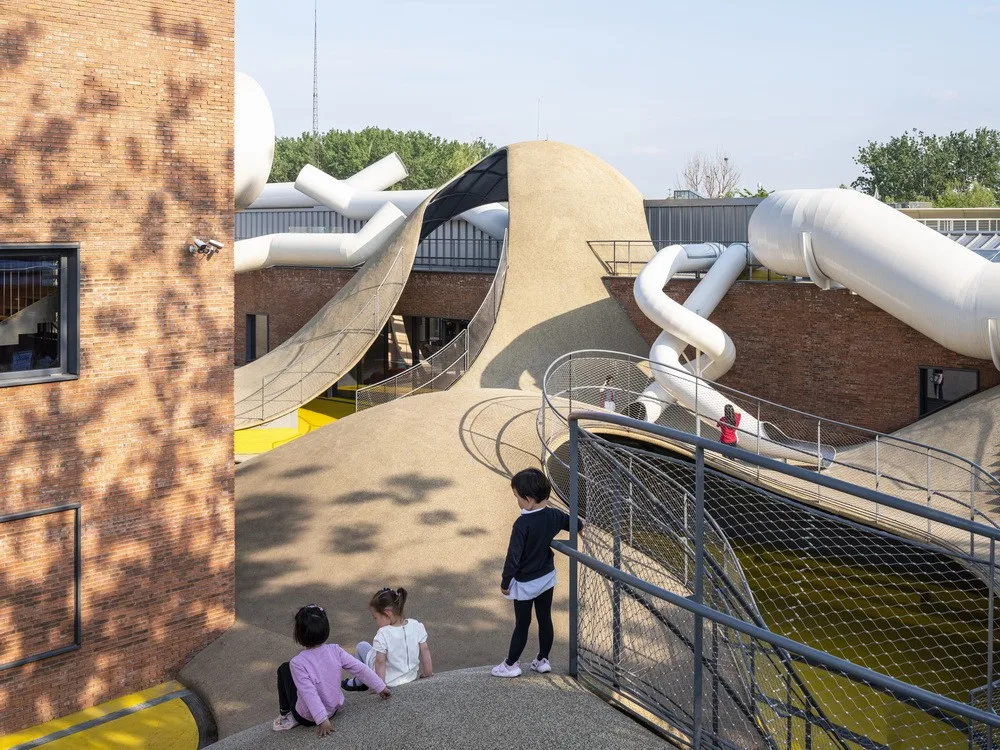 BIM Architecture | Hilltop and Pipe Slide: The Playscape Children's Growth Center/Unaware Architecture