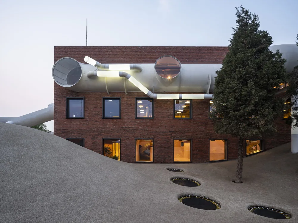 BIM Architecture | Hilltop and Pipe Slide: The Playscape Children's Growth Center/Unaware Architecture