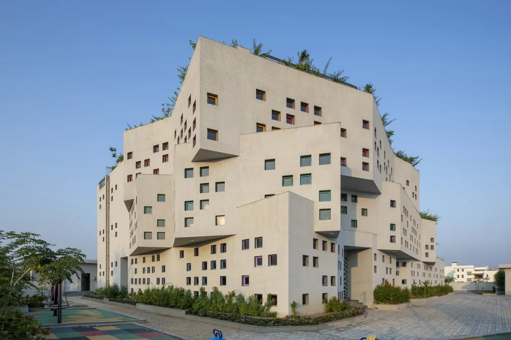 BIM Architecture | Inspired by the triangular cheese in cartoons! /SferaBlu Architects