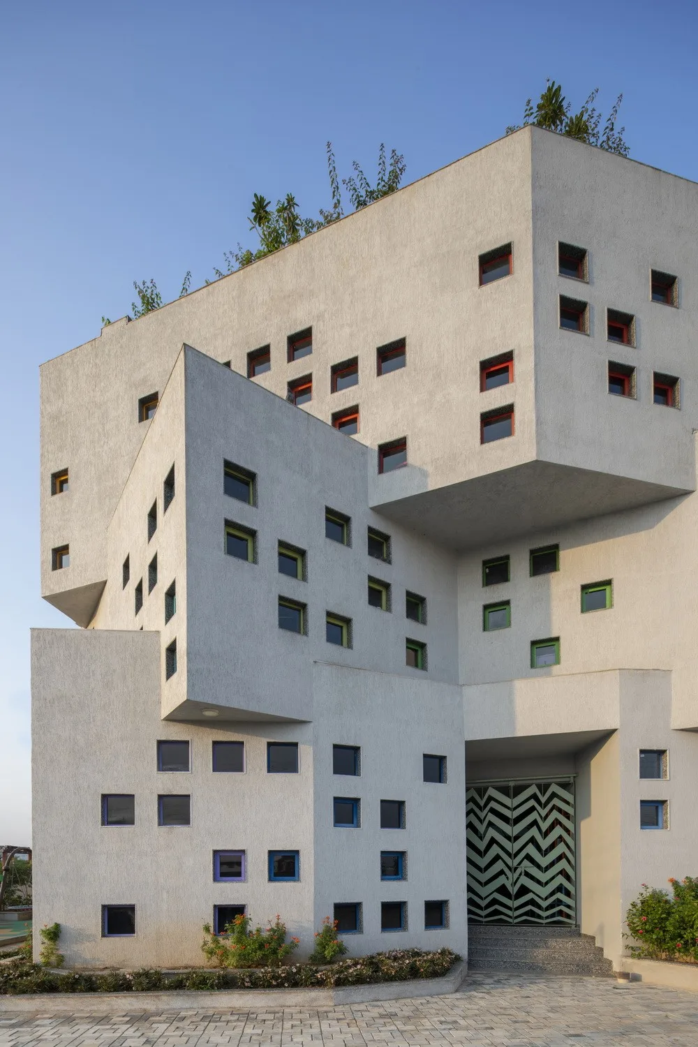 BIM Architecture | Inspired by the triangular cheese in cartoons! /SferaBlu Architects