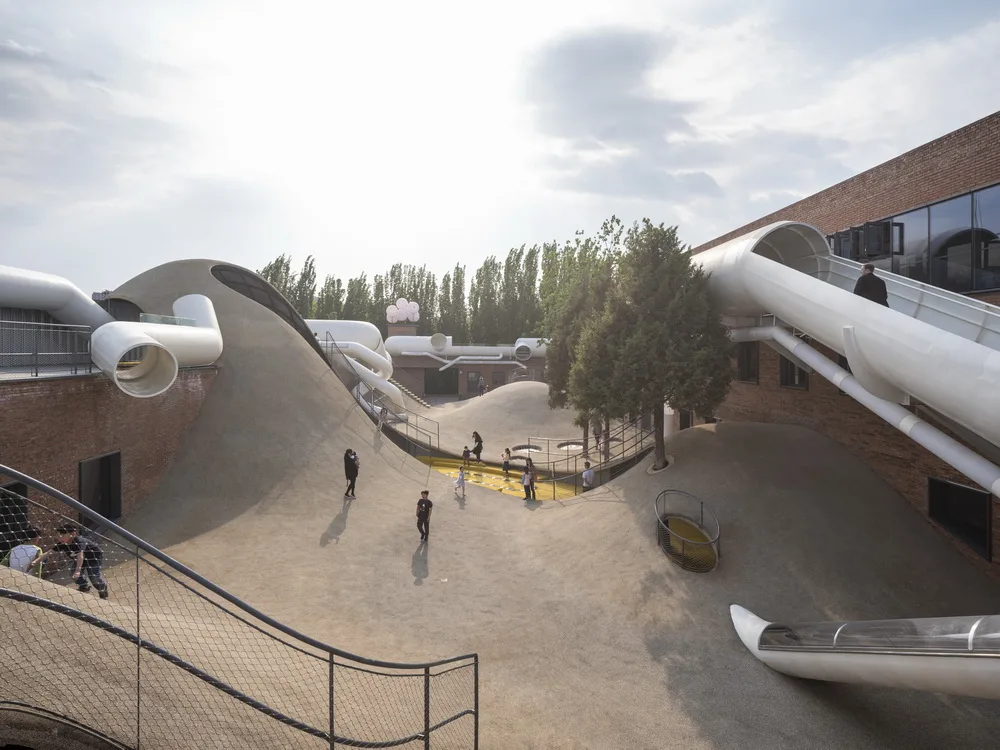 BIM Architecture | Hilltop and Pipe Slide: The Playscape Children's Growth Center/Unaware Architecture