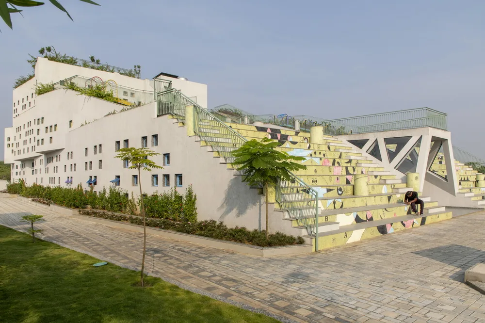 BIM Architecture | Inspired by the triangular cheese in cartoons! /SferaBlu Architects