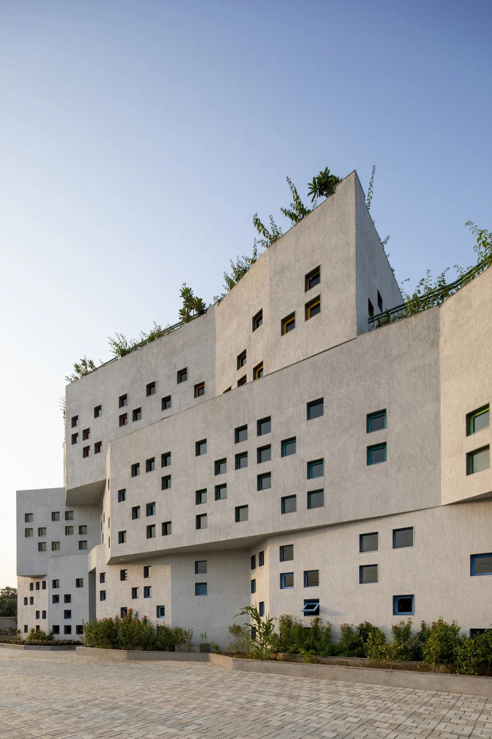 BIM Architecture | Inspired by the triangular cheese in cartoons! /SferaBlu Architects