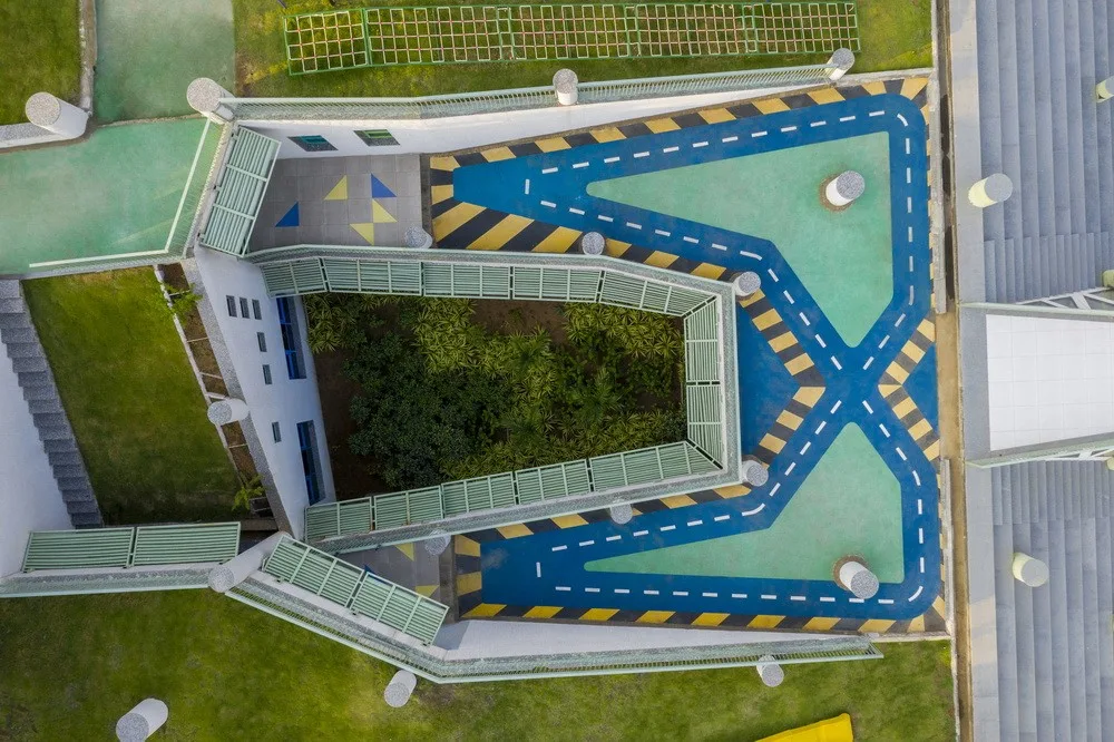 BIM Architecture | Inspired by the triangular cheese in cartoons! /SferaBlu Architects
