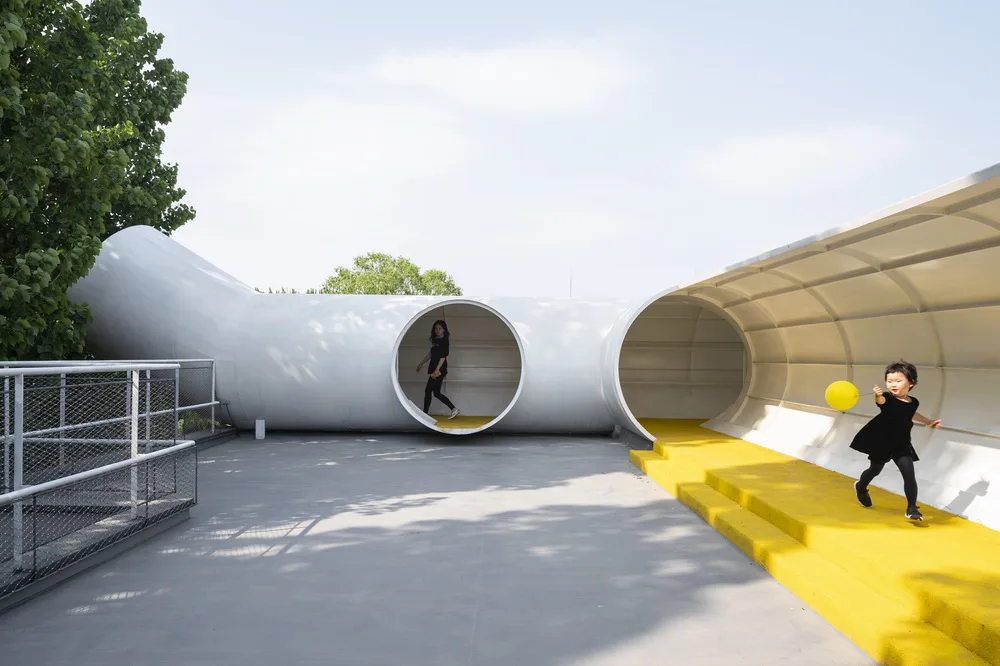 BIM Architecture | Hilltop and Pipe Slide: The Playscape Children's Growth Center/Unaware Architecture