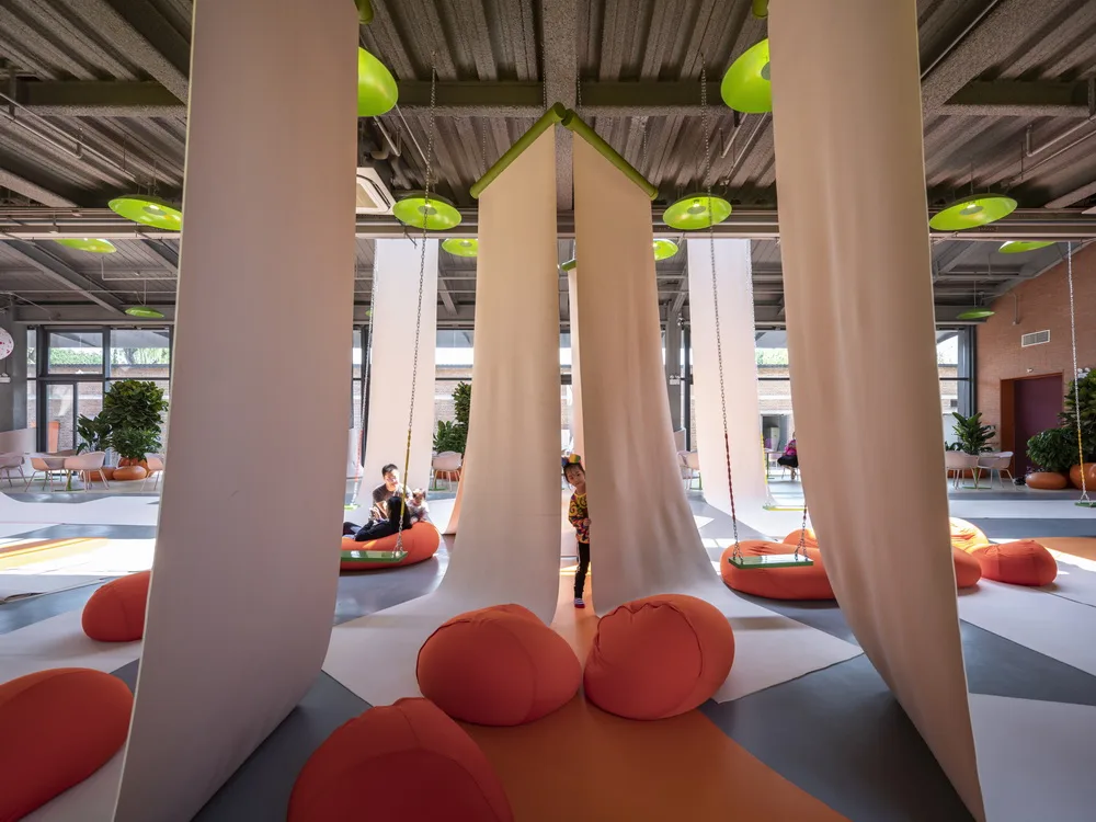 BIM Architecture | Hilltop and Pipe Slide: The Playscape Children's Growth Center/Unaware Architecture