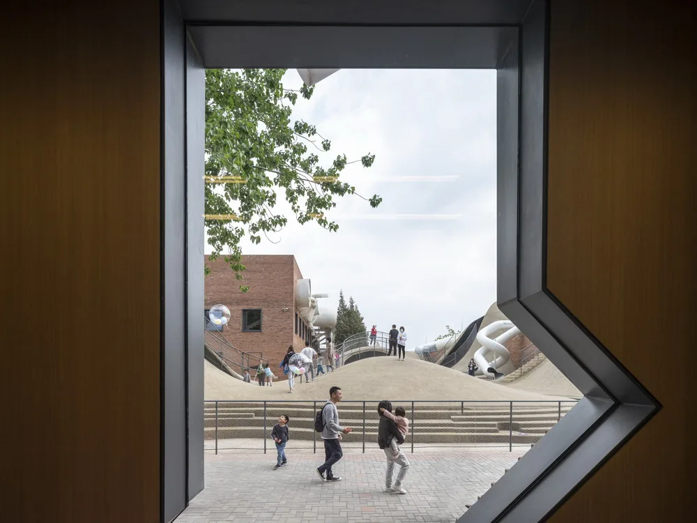 BIM Architecture | Hilltop and Pipe Slide: The Playscape Children's Growth Center/Unaware Architecture