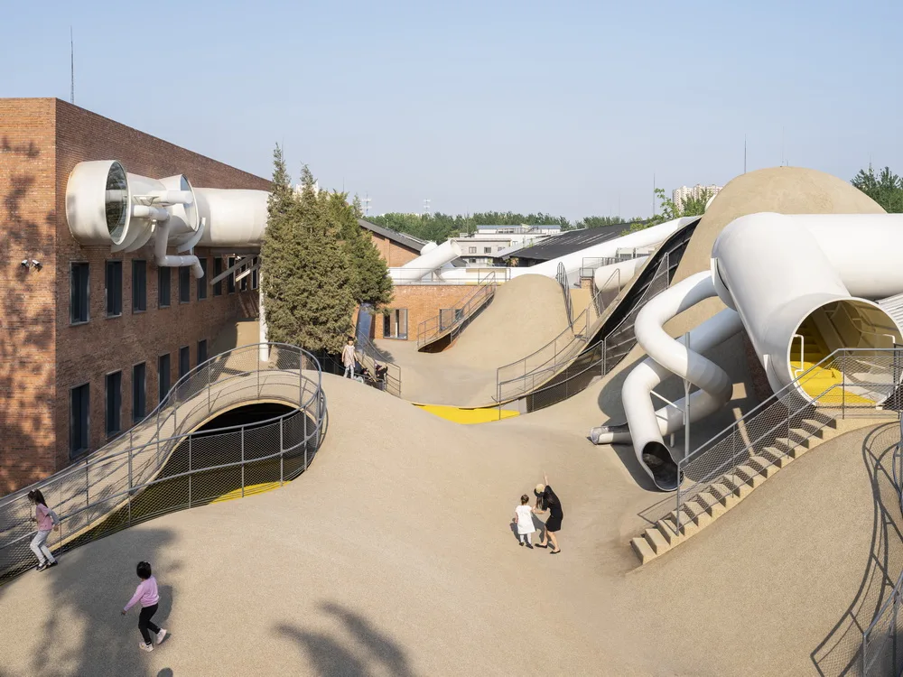 BIM Architecture | Hilltop and Pipe Slide: The Playscape Children's Growth Center/Unaware Architecture