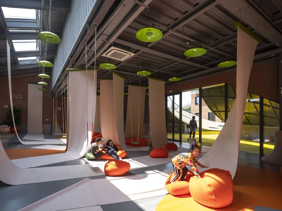 BIM Architecture | Hilltop and Pipe Slide: The Playscape Children's Growth Center/Unaware Architecture