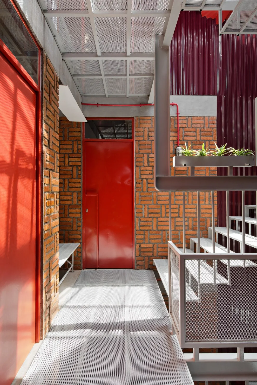 BIM Architecture | 'Gradually Stacking' Red Zone Boarding Apartments/Ismail Solehudin Architecture