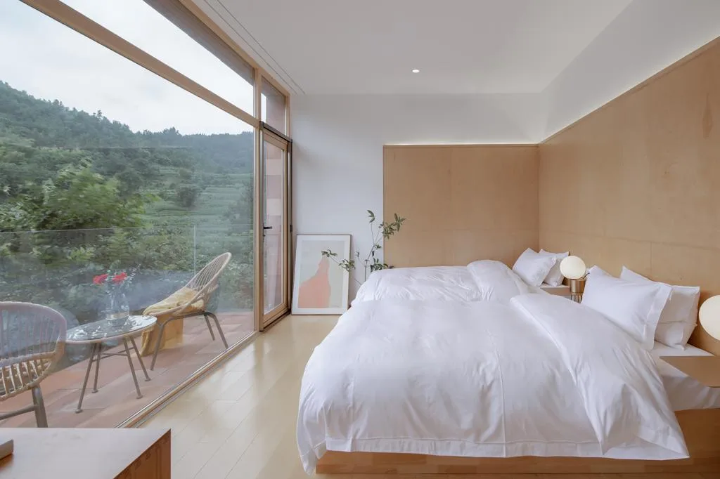 BIM Architecture | Red Stone Houses in High Mountains, Flowing Waters, and Pine Forests/Plain Architecture Design Firm