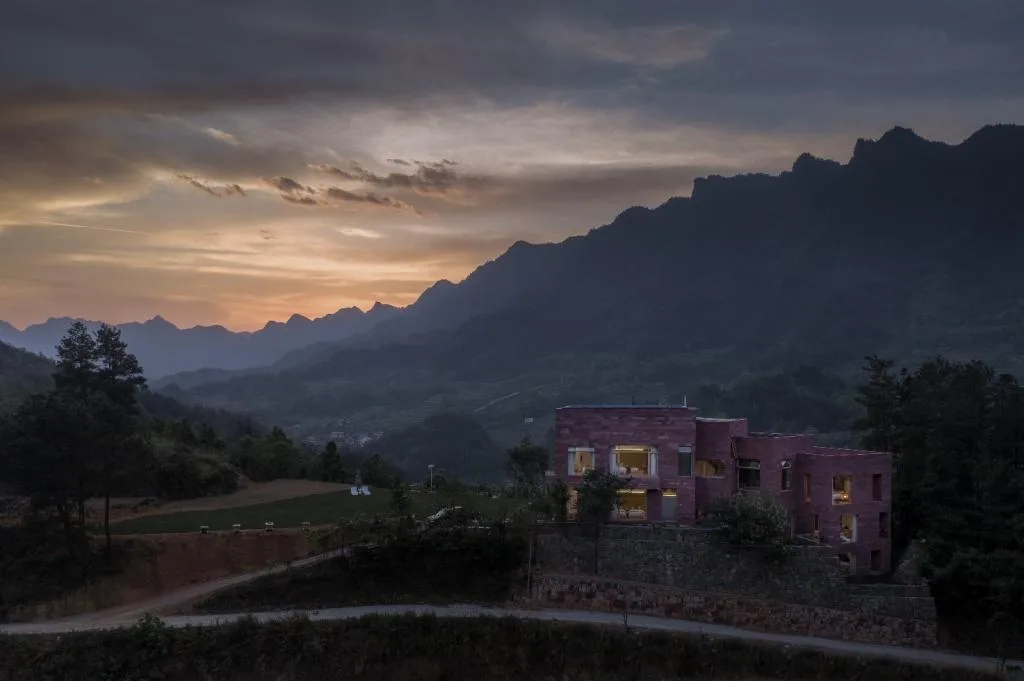 BIM Architecture | Red Stone Houses in High Mountains, Flowing Waters, and Pine Forests/Plain Architecture Design Firm