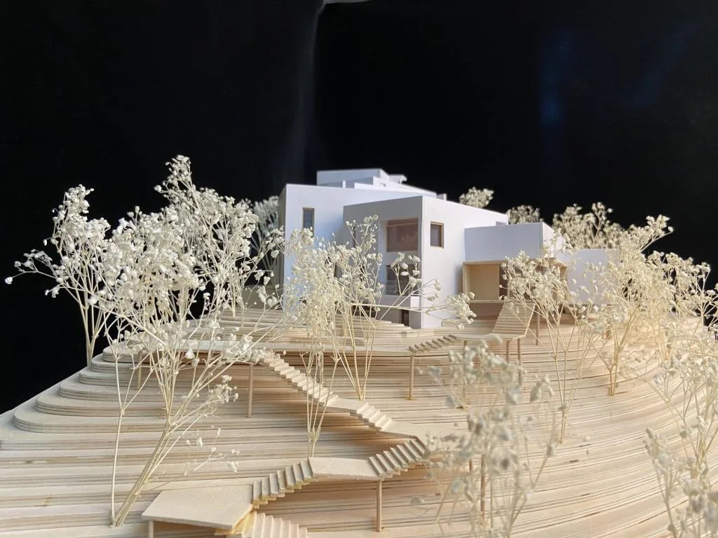 BIM Architecture | Red Stone Houses in High Mountains, Flowing Waters, and Pine Forests/Plain Architecture Design Firm
