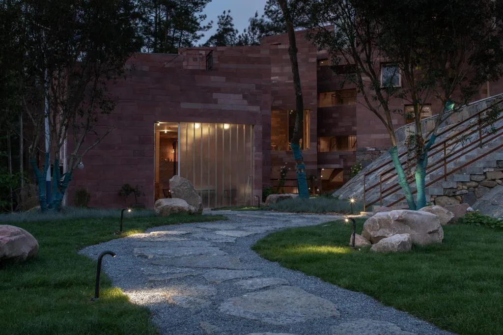 BIM Architecture | Red Stone Houses in High Mountains, Flowing Waters, and Pine Forests/Plain Architecture Design Firm