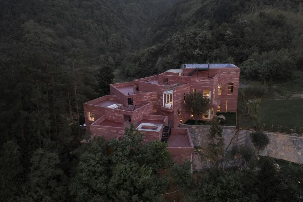 BIM Architecture | Red Stone Houses in High Mountains, Flowing Waters, and Pine Forests/Plain Architecture Design Firm