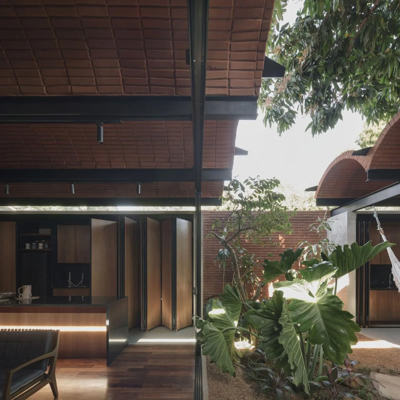 BIM Architecture | Handmade pressed brick and wood construction for self owned houses/Equipo de Arquitectura