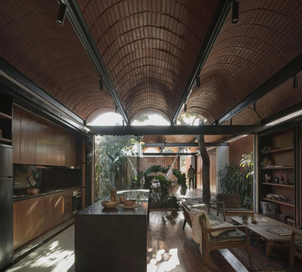 BIM Architecture | Handmade pressed brick and wood construction for self owned houses/Equipo de Arquitectura