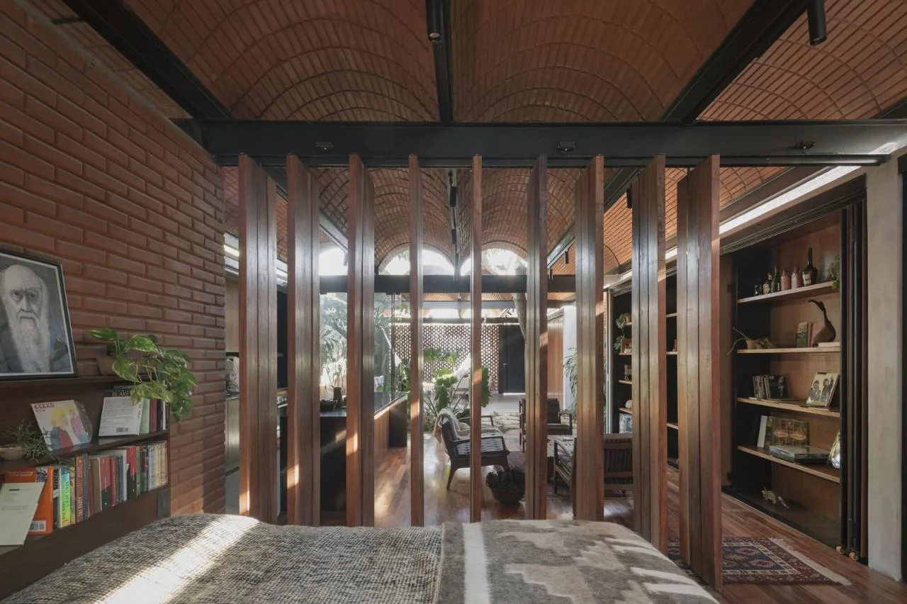 BIM Architecture | Handmade pressed brick and wood construction for self owned houses/Equipo de Arquitectura