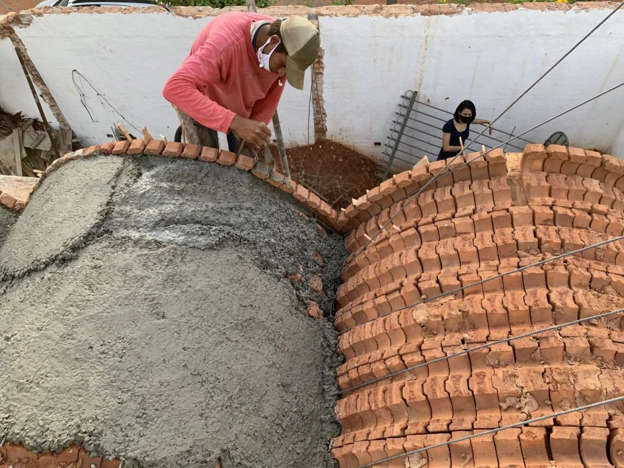 BIM Architecture | Handmade pressed brick and wood construction for self owned houses/Equipo de Arquitectura