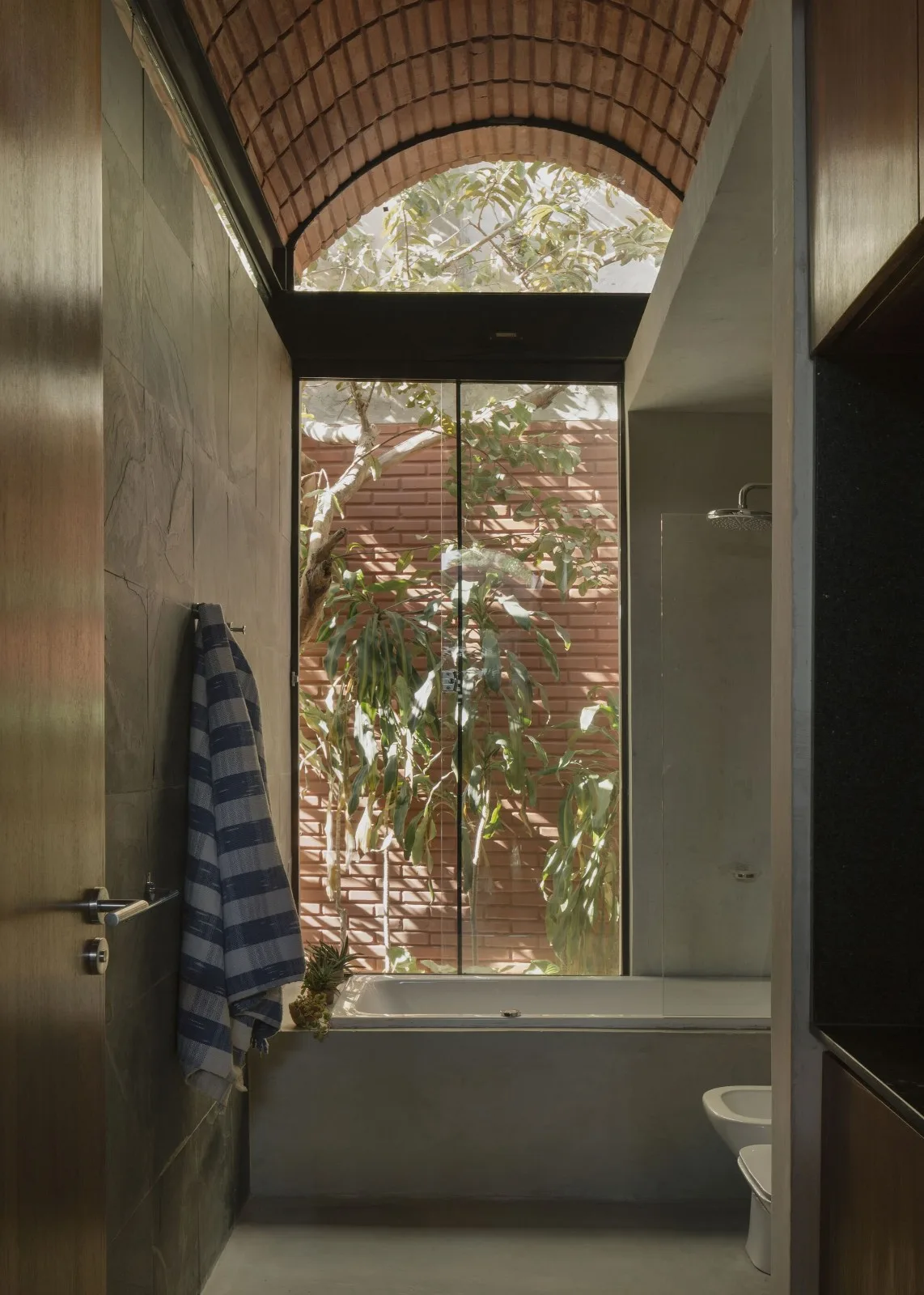 BIM Architecture | Handmade pressed brick and wood construction for self owned houses/Equipo de Arquitectura