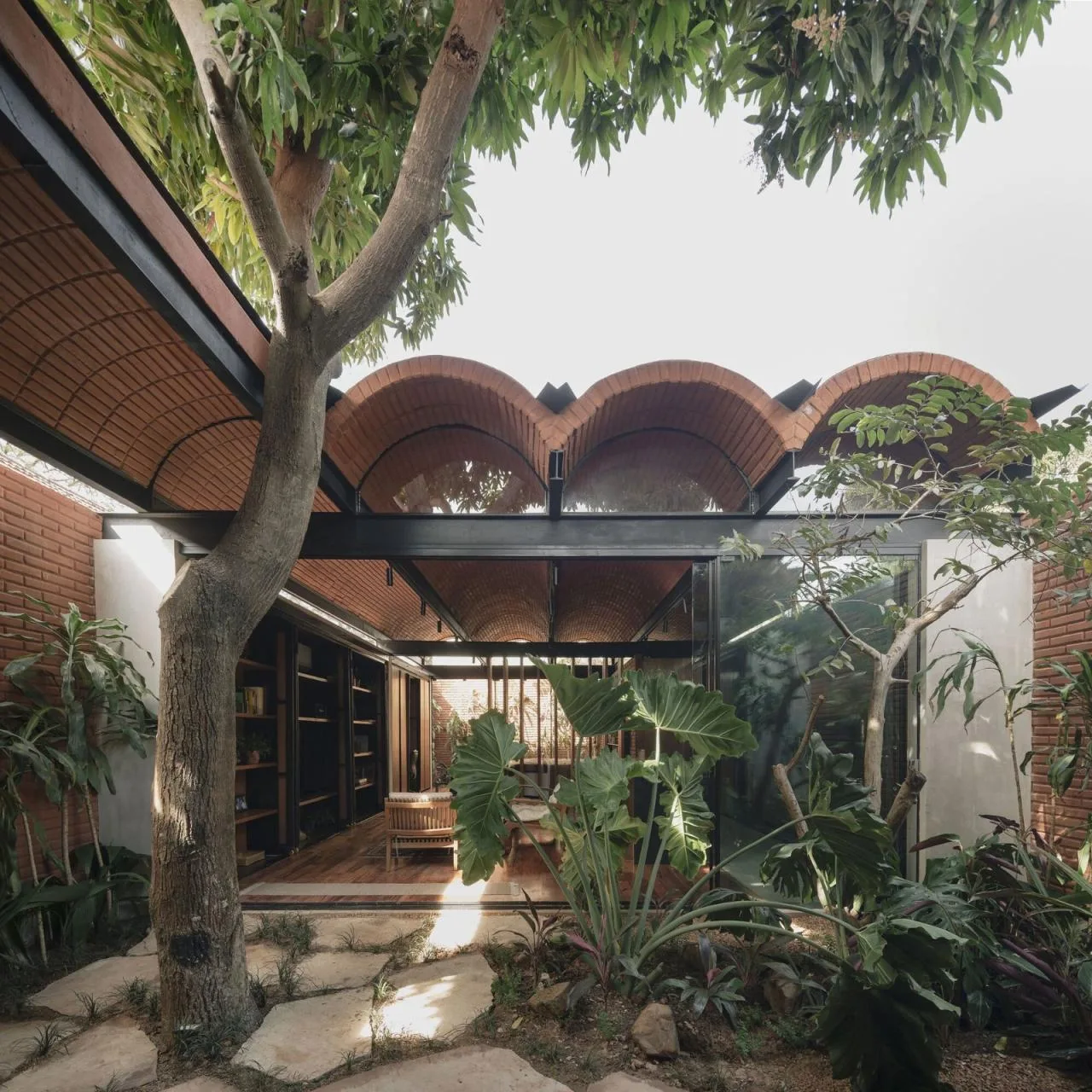 BIM Architecture | Handmade pressed brick and wood construction for self owned houses/Equipo de Arquitectura