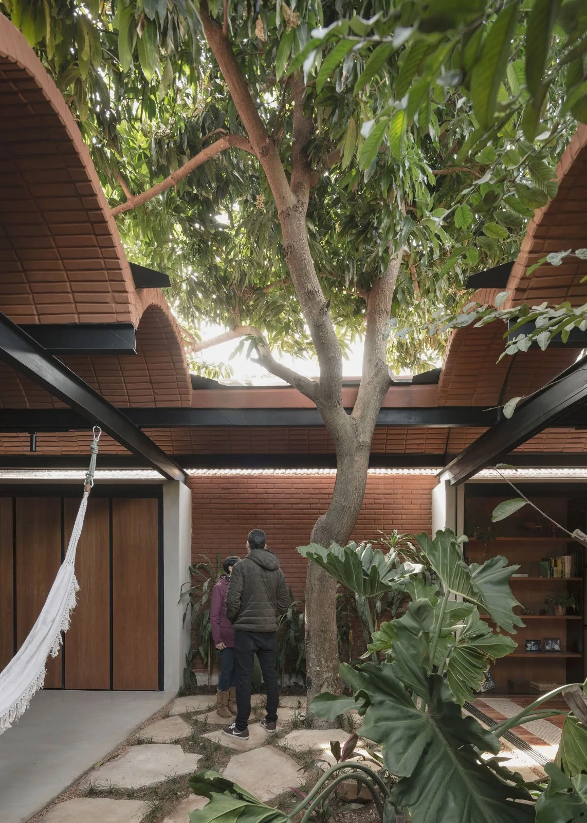 BIM Architecture | Handmade pressed brick and wood construction for self owned houses/Equipo de Arquitectura